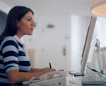 Woman in front of computer